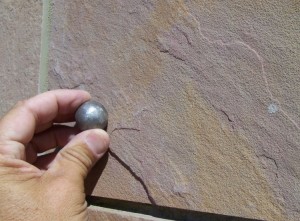 You can tap a tile with a ball bearing to test for hollow-sounding tile.