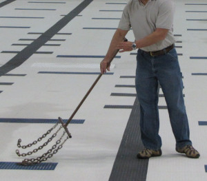 Large tile areas can be sounded with a chain.