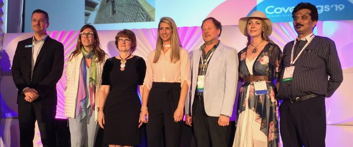 Coverings 2019 CID winners on stage