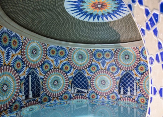 Tile Grotto Stunning grotto project combines custom glass and ceramic mosaic with ...