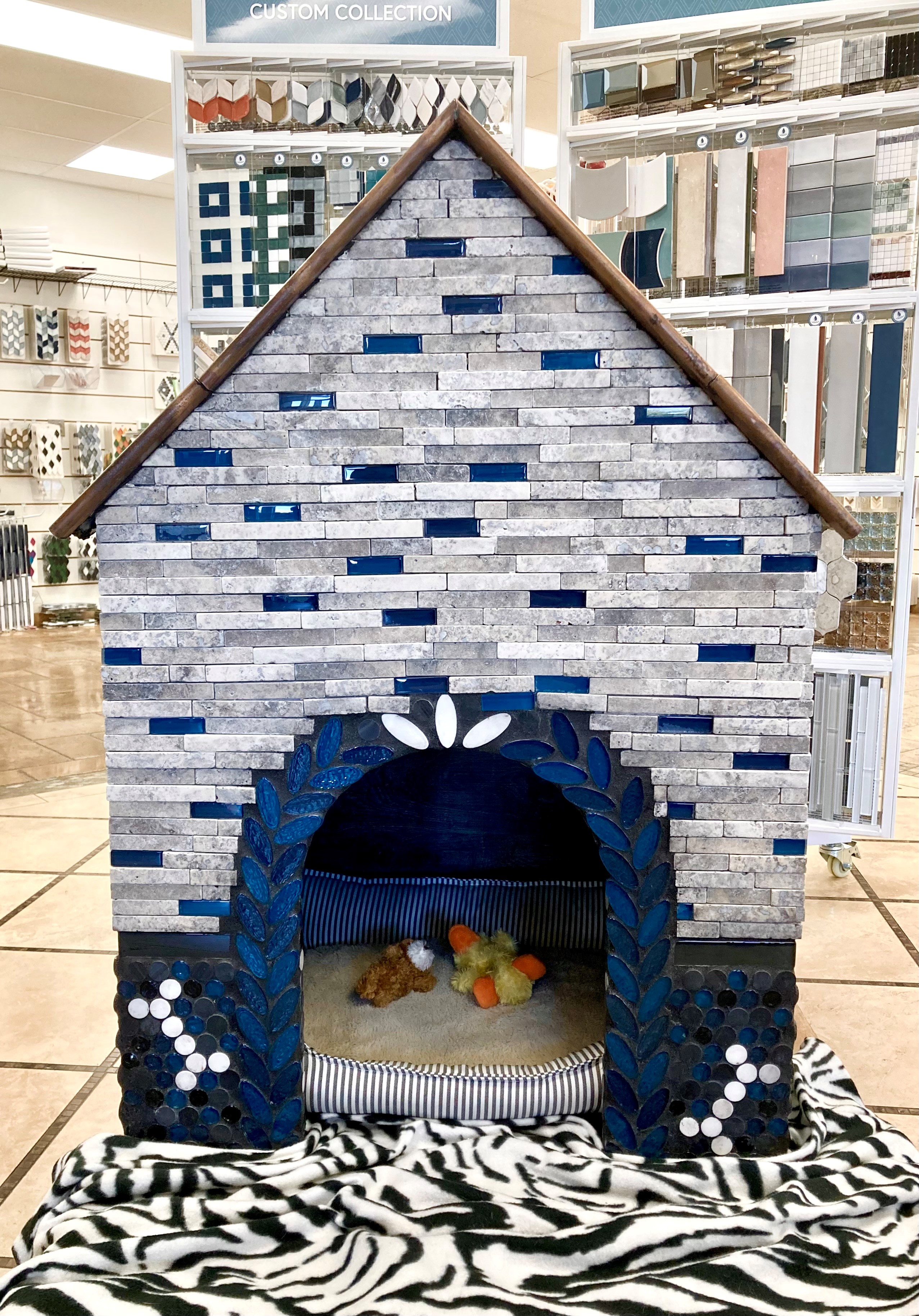 TCNA members donate tiled doghouses | Coverings 2026