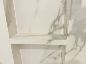 Laminam gauged porcelain mitered niche with veins continuation