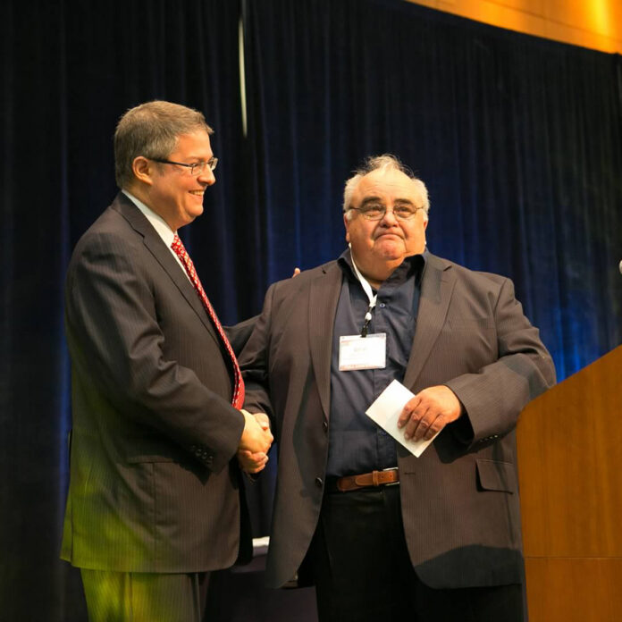 TCNA's Eric Astrachan awards Dave Gobis 2015 Tile Person of the Year